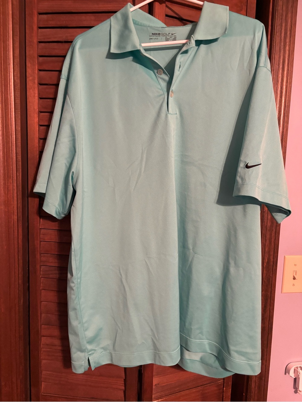 Nike Men’s Bright Teal Polo with Sleeve Swoosh